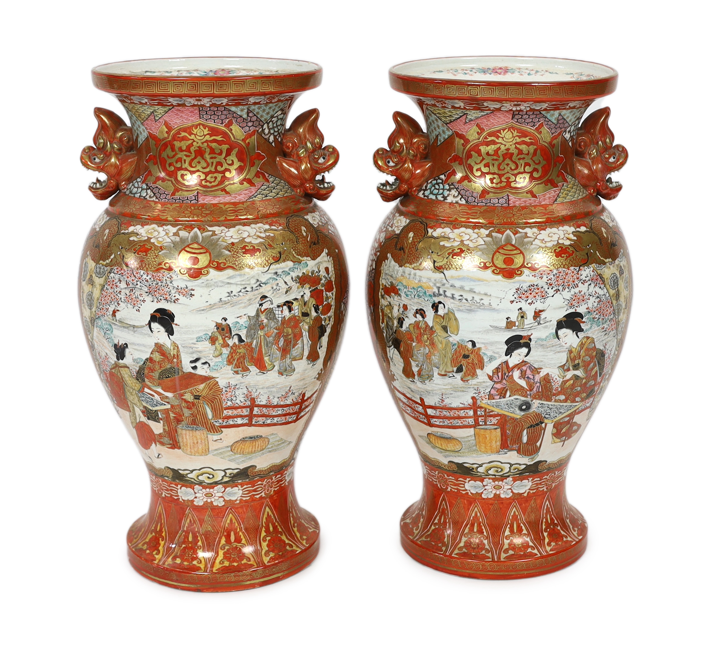 A pair of massive Japanese Kutani vases, Meiji period, one neck restored